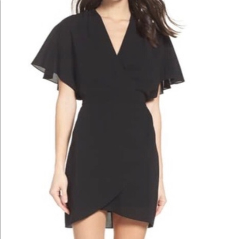 Super cute black mini dress by Aly and Jay